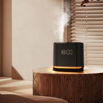 Digital clock aroma diffuser releasing mist on a wooden table in a living room