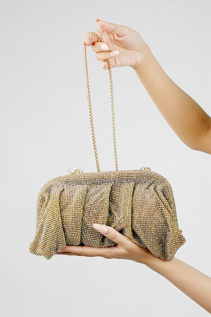 Shimmer rhinestone clutch bag held by the chain, side view