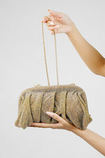 Shimmer rhinestone clutch bag held by the chain, side view
