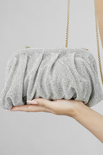 Silver clutch bag for women with matching chain, front view