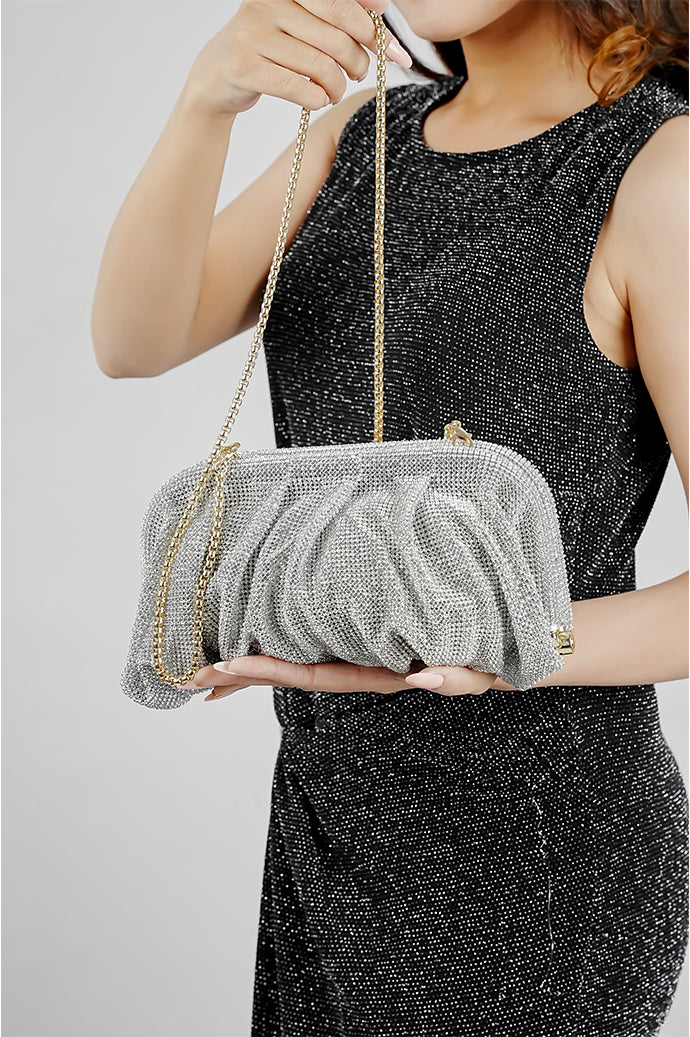 Silver clutch bag for women held in front with the chain, Future Style Pakistan