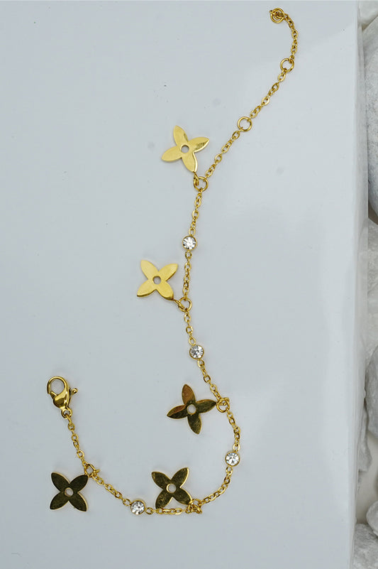 Gold-tone chain bracelet with clover-style charms and small stones, Future Style Pakistan