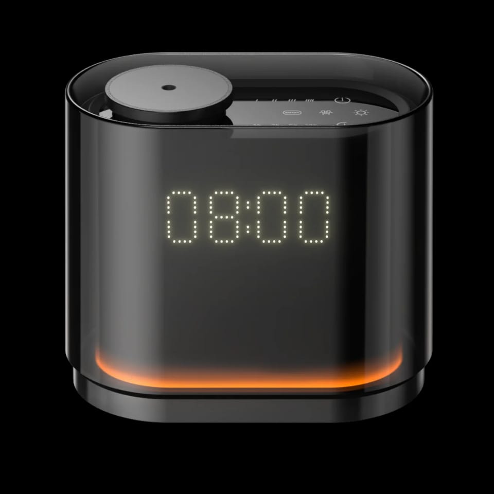 Black digital clock aroma diffuser with warm amber base light, Future Life Style Pakistan