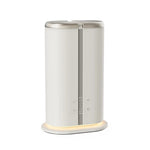 Cream dual scent aroma diffuser with gold-tone top and warm base light, Future Life Style Pakistan
