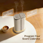 Dual scent aroma diffuser releasing mist from two outlets with scheduled scent times