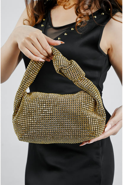 Hubo gold sparkling clutch for women with knot handle held in both hands, Future Style Pakistan