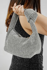 Hubo silver clutch for women carried on the arm