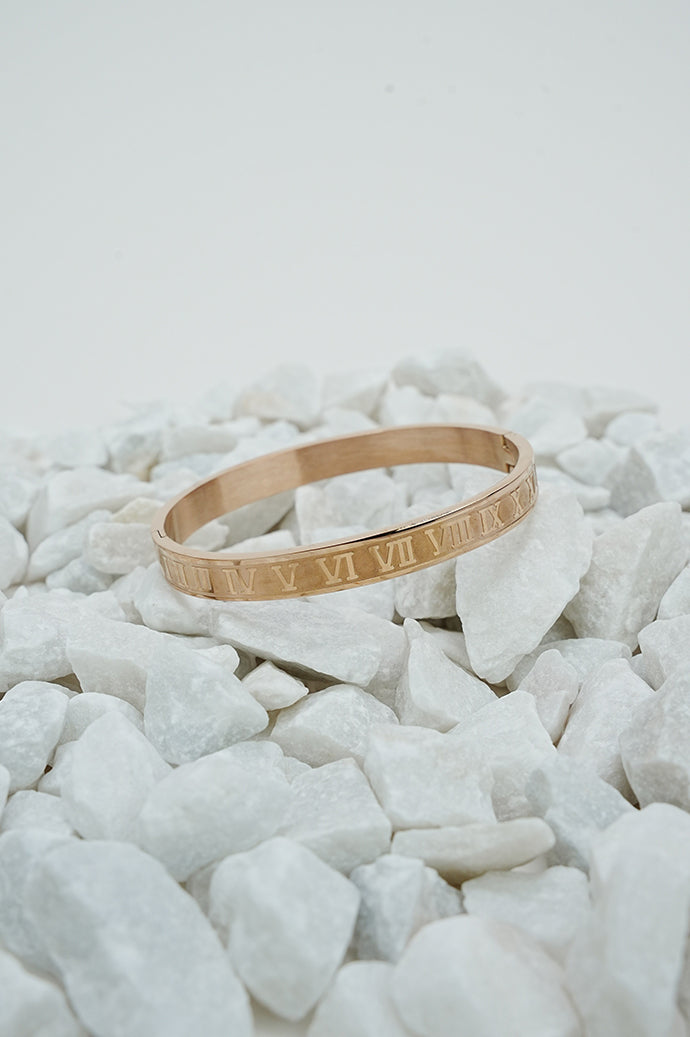 Rose gold close bangle with Roman numeral design from Future Style