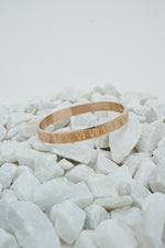 Rose gold close bangle with Roman numeral design from Future Style