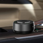 Black smart car aroma diffuser on a car dashboard, Future Life Style Pakistan