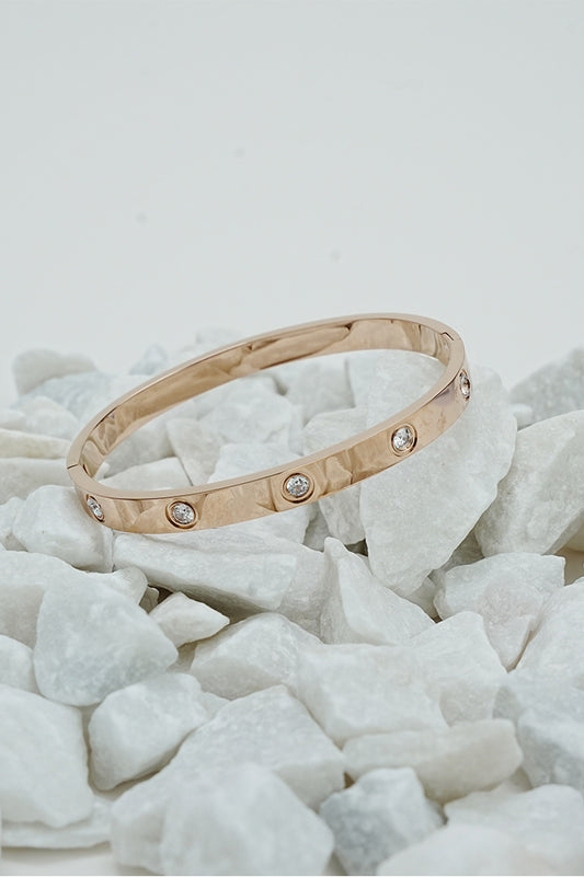 Solitaire bangle for women in rose gold-tone finish with stone detail, Future Style Pakistan
