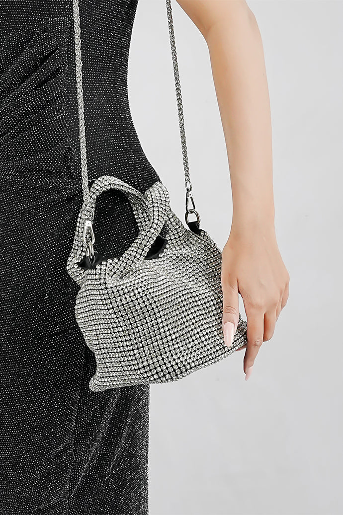 Silver crystal bucket bag with chain strap, side view
