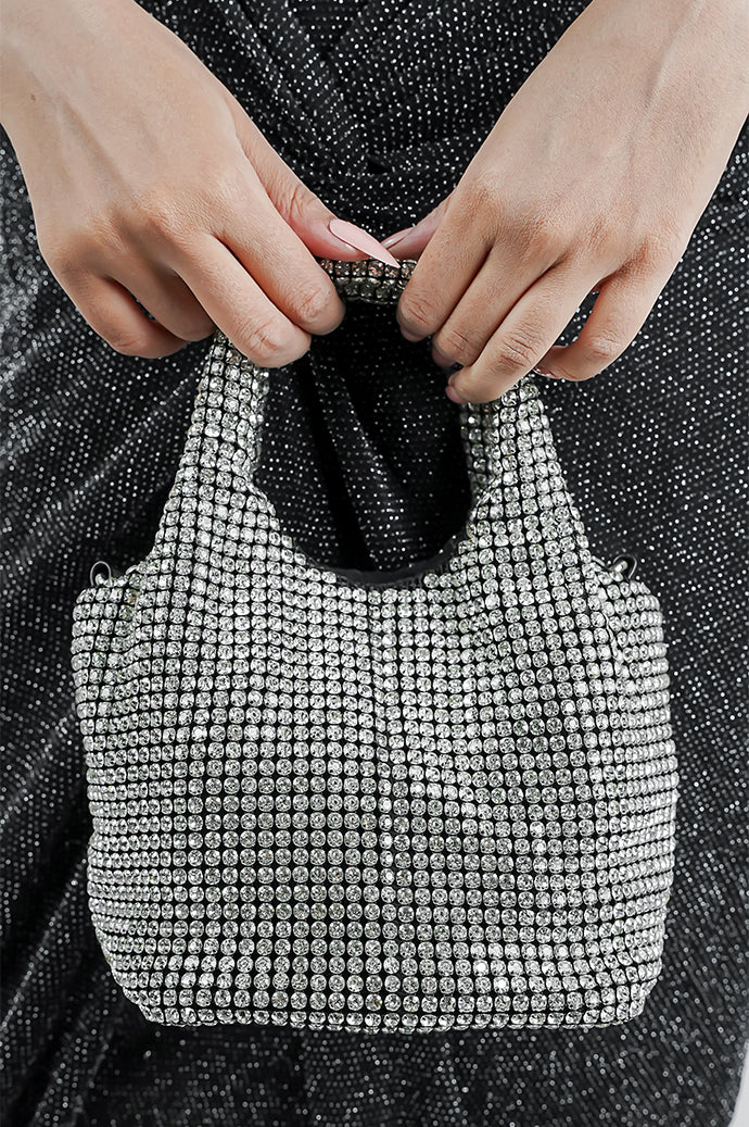 Stellar silver crystal bucket bag held by the handles, front view