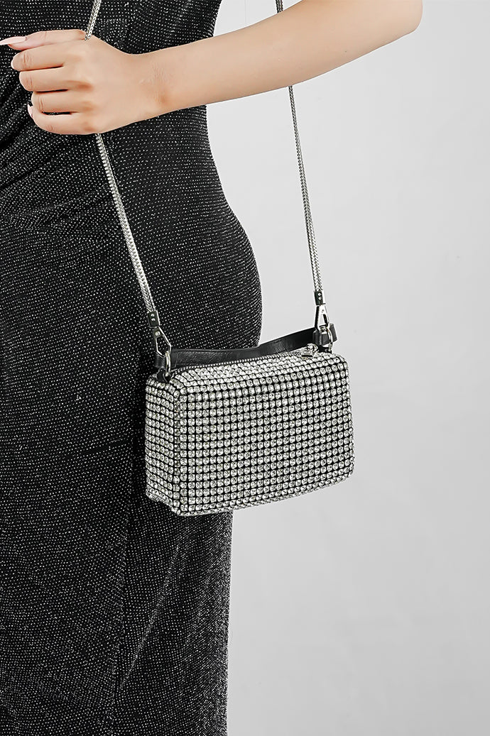 Wang Large silver sparkling bag on a long black strap, worn at the hip