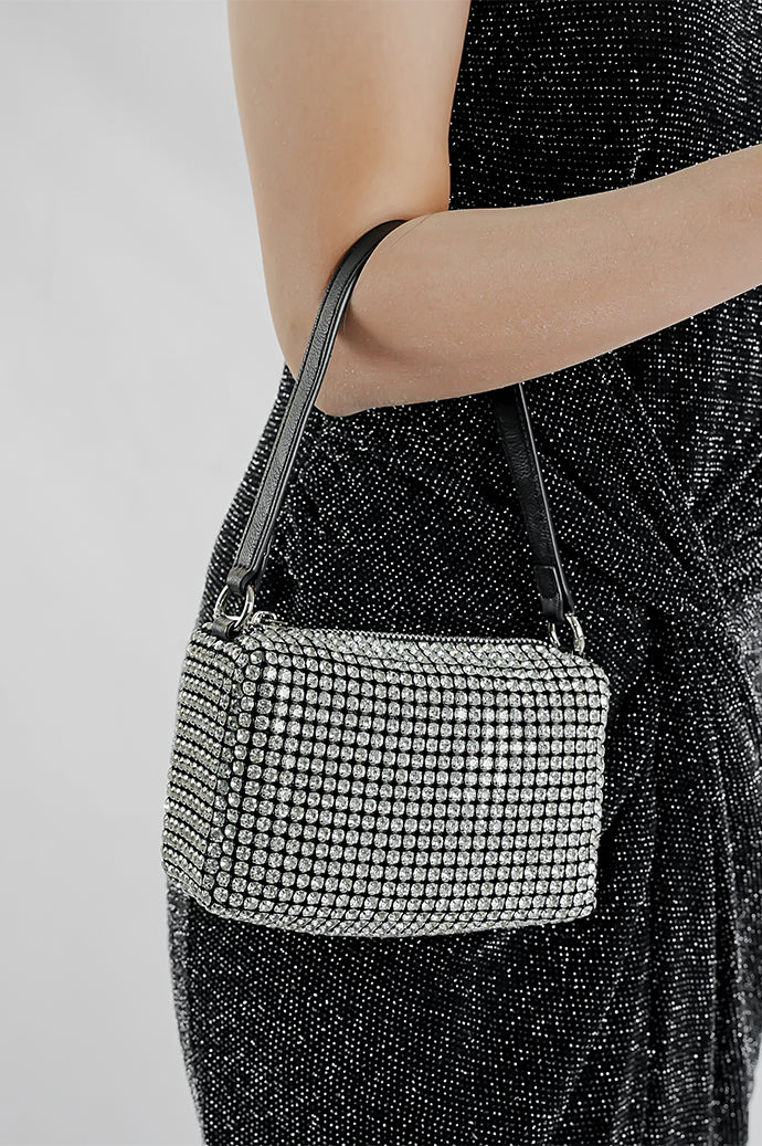 Wang Large silver sparkling bag carried on the arm by its black strap
